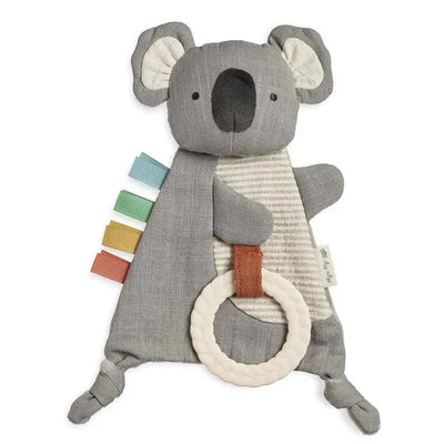 Koala-shaped crinkle toy featuring textured fabric, colorful tags, and a rubber teether ring for sensory play.