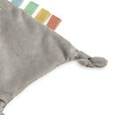 A soft gray sensory crinkle toy with colorful tags, knotted ends, designed for babies, labeled as a teething toy.