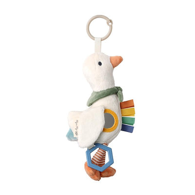 Plush duck toy with a clip, features colorful ribbons, a rattle, and a teething ring, designed for babies.