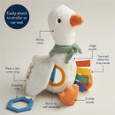 Bitzy Traveler Car Seat & Stroller Toy features a soft white duck with various textures, a grasping ring, and crinkle sounds.