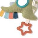 Soft dinosaur teether in green fabric, featuring colorful ribbon tags and a star-shaped attachment.