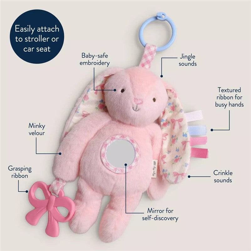 Sensory development toy featuring a pink bunny with textured ribbons, a mirror, crinkle sounds, and a grasping bow.