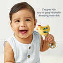 Smiling baby holding a yellow chicken-shaped rattle with easy-to-grasp handles, promoting motor skill development.