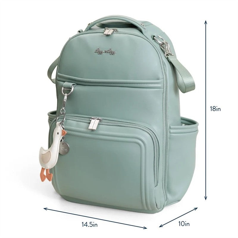 Mint green Itzy Ritzy Boss Plus™ Backpack Diaper Bag with duck charm, measuring 18in tall and 14.5in wide.