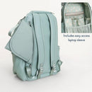 Light blue Itzy Ritzy Boss Plus™ Backpack Diaper Bag with an external pocket and laptop sleeve, featuring a soft interior.