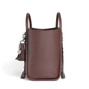 Espresso brown Itzy Ritzy Boss Tote™ diaper bag featuring a textured finish, short handles, and a detachable tassel charm.