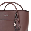 Brown Itzy Ritzy Boss Tote™ diaper bag with a textured finish, featuring a tassel and a charm, designed for parents.