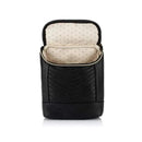 Chic black insulated bottle bag with a zippered opening and cream polka-dotted lining, perfect for transporting beverages.