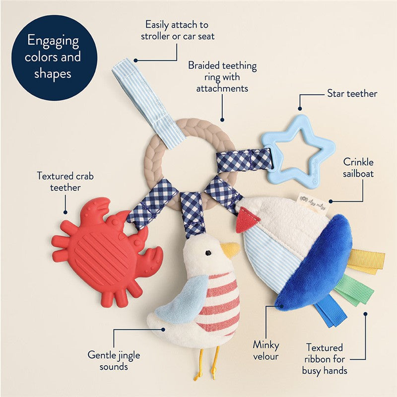 Teething toy featuring a crab, bird, and sailboat; includes crinkly textures and a braided teething ring for infants.