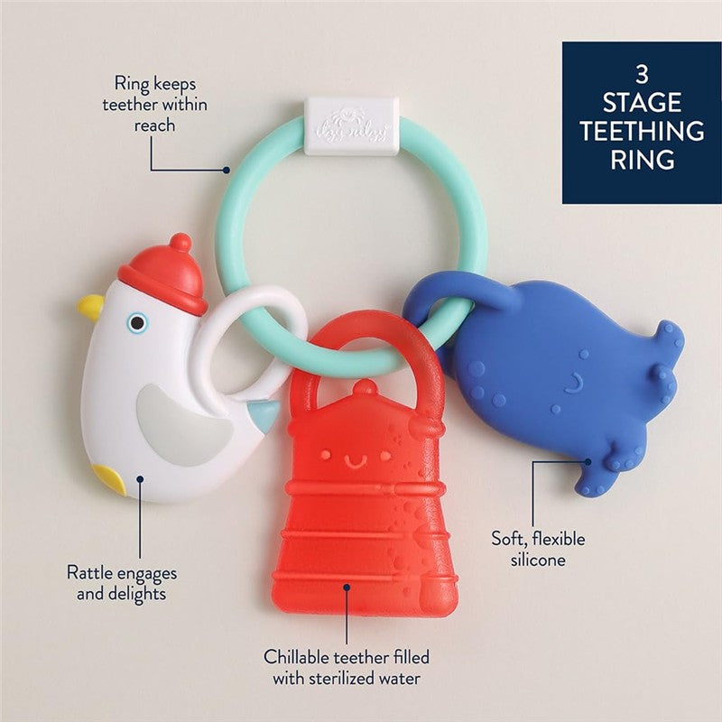 Multistage teething ring featuring a white bird, red bell, and blue sea creature, made of soft silicone for teething relief.