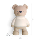 Natural rubber bear teether wearing a white sweater, measuring 4.2 inches tall, 2.5 inches wide, and 1.8 inches deep.