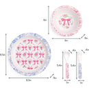 Bistro 4-piece dining set featuring a blue floral plate, pink bowl with bow design, and matching utensils.