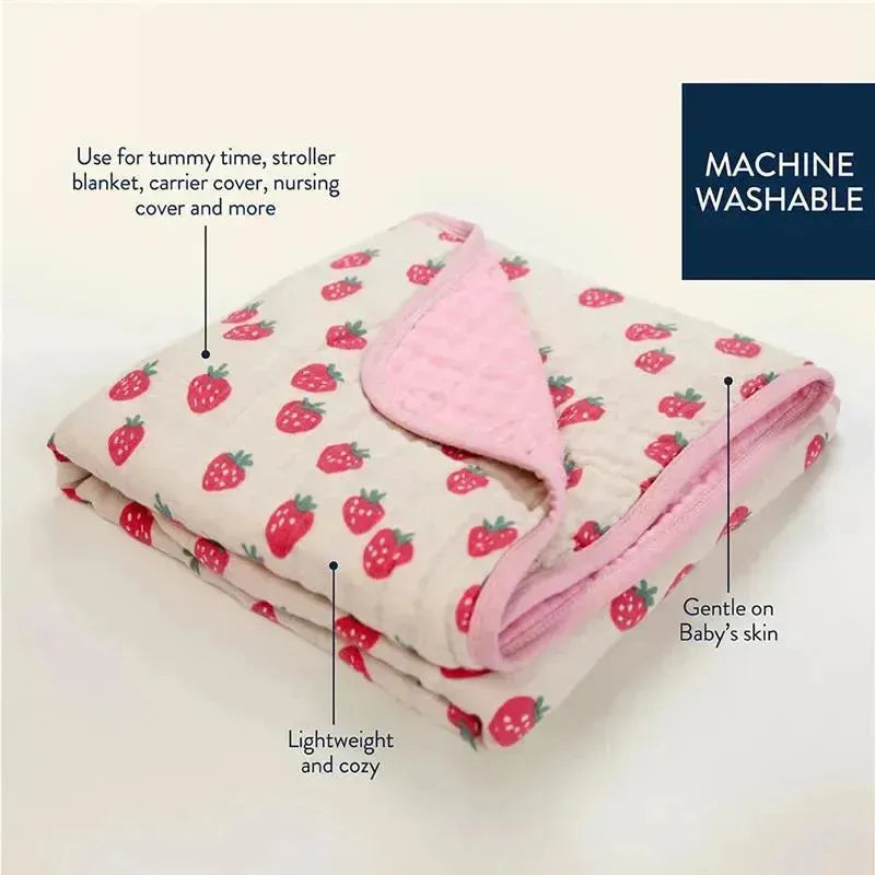 Itzy Ritzy Itzy Blanket™ in Strawberries + Cream design, lightweight, cozy, machine washable, suitable for various uses.
