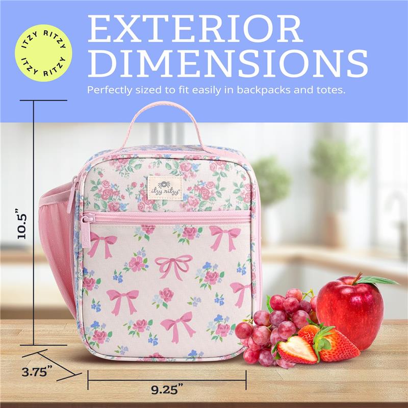 Toddler lunch box with floral design, pink ribbons, dimensions noted, and fruit display beside it on a table.