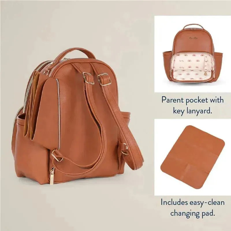Mini Plus Diaper Bag in cognac color featuring parent pocket with key lanyard and an easy-clean changing pad.