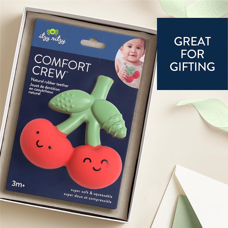 Natural rubber teether shaped like cherries, featuring a smiling design, packaged with gifting suggestions. Suitable for 3 months+.