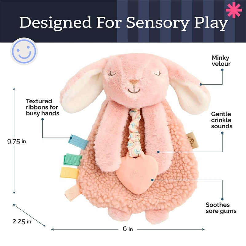 Pink bunny lovey with a teether, featuring textured ribbons, gentle crinkle sounds, and designed for sensory play.