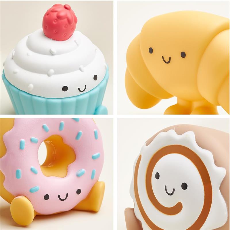 Colorful Itzy Ritzy Put & Take Activity Toy Bakery features a cupcake, croissant, donut, and cinnamon roll, each with smiley faces.