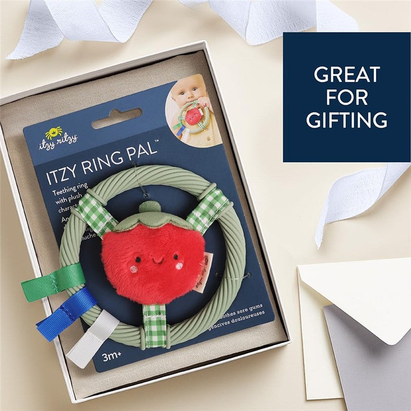 Itzy Ritzy Ring Pal teething ring featuring a plush tomato character, presented in a gift box with ribbons.