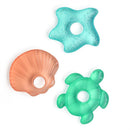 Three colorful, silicone cooling teethers shaped like a starfish, shell, and turtle. Ideal for soothing teething infants.