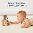 Sensory Tummy Time Toy Mirror Bear beside an infant, who is reaching out with joy during playtime.