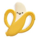 Silicone banana-shaped teether with easy-grab handles, featuring a smiling face and textured surfaces for infants.
