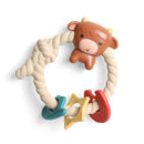 Silicone teether and rattle featuring a smiling Highland cow design with colorful teething rings.