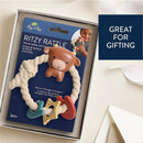 Silicone teether with rattle shaped like a Highland cow, designed for infants 3 months and older, great for gifting.