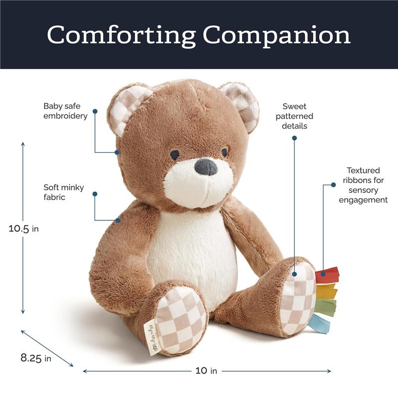 Soft bear plush toy with baby-safe embroidery, minky fabric, and textured ribbons for sensory engagement, measuring 10.5 x 10 inches.