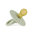 Natural rubber pacifier in succulent agave color with a round yellow nipple and a textured handle.