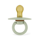 Natural rubber pacifier by Itzy Ritzy in succulent agave color, featuring a rounded golden tip and textured ring handle.