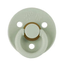 Natural rubber pacifier by Itzy Ritzy in succulent agave color, featuring a round base and rope-style handle.