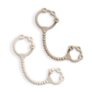 Silicone toy and snack cup straps in toast and buttercream colors, featuring textured and smooth designs.
