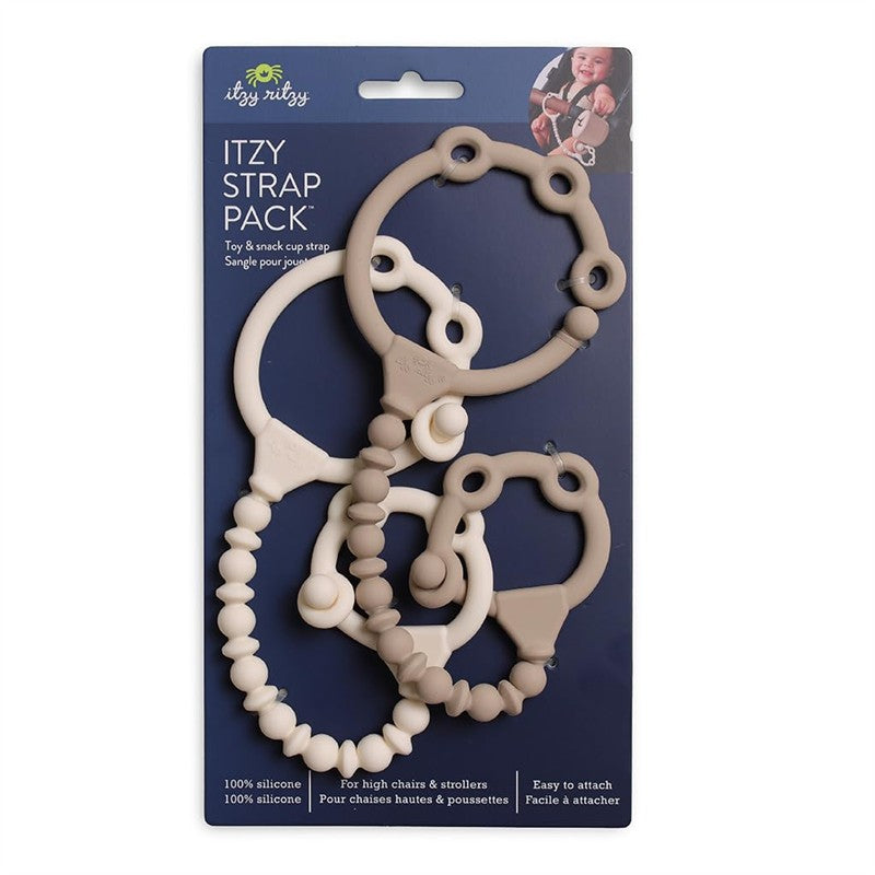 Itzy Ritzy Strap Pack featuring two silicone toy and snack cup straps in Toast and Buttercream colors, designed for high chairs and strollers.