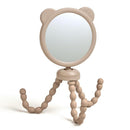 Stroller mirror shaped like a bear, with a round reflective surface and flexible, bead-like legs for easy attachment.