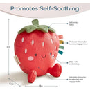 Plush strawberry toy with soft fabric, textured ribbons, and baby-safe embroidery, promoting self-soothing for infants.