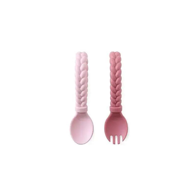 Silicone baby utensils set in pink featuring a spoon and a fork with braided handles.