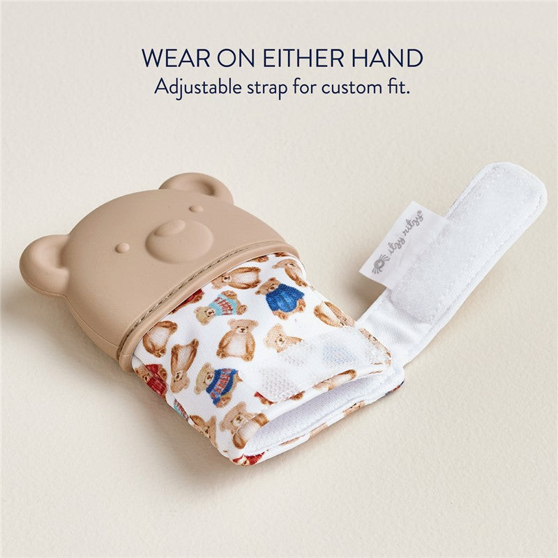 Teething mitt designed as a bear with an adjustable strap, featuring a pattern of colorful bears on soft fabric.