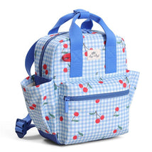 Toddler-sized backpack featuring a light blue gingham pattern adorned with cherry prints and a front zippered pocket.