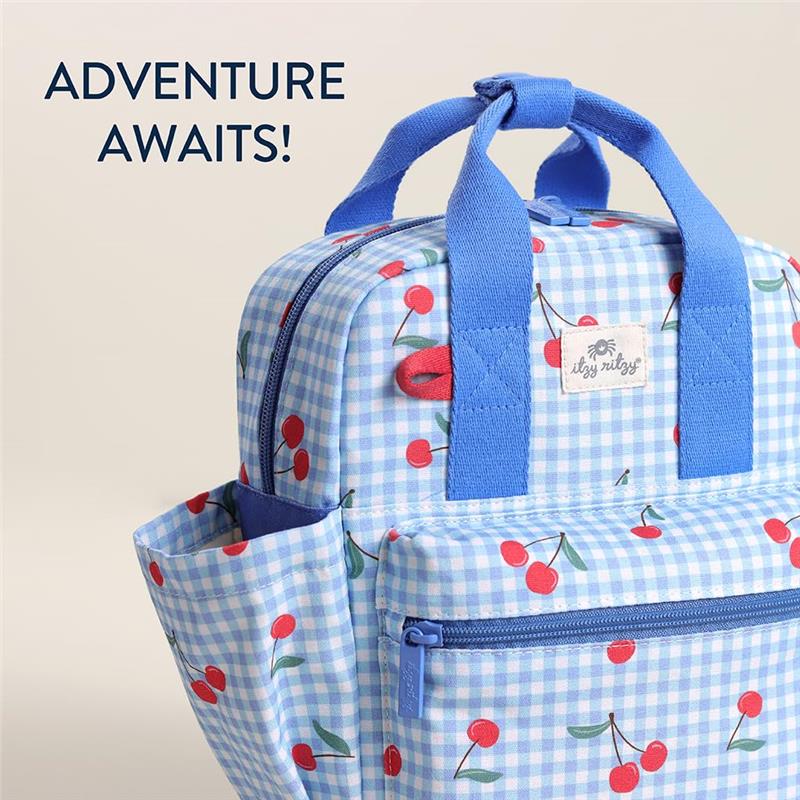 Toddler backpack featuring a blue gingham pattern with cherry print, blue handles, and a front zipper pocket.