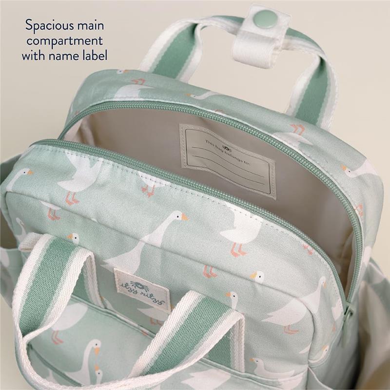 Toddler backpack by Itzy Ritzy in mint green with a goose pattern, featuring a spacious main compartment and name label inside.