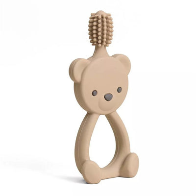 360-degree training toothbrush designed for toddlers, shaped like a bear in a soft beige color with textured bristles.