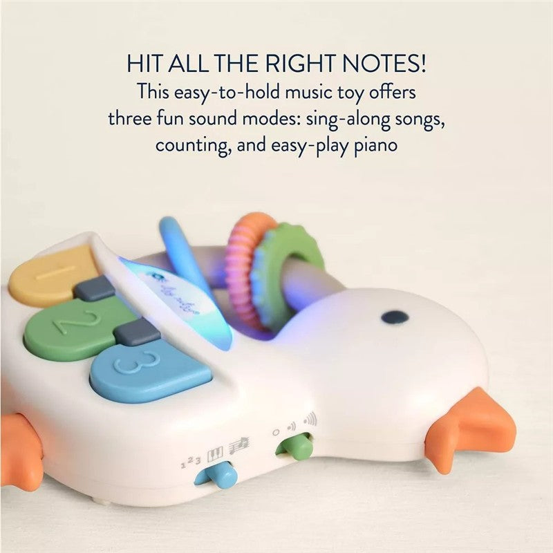 Light-up interactive piano toy shaped like a goose, featuring colorful keys and three sound modes for kids.
