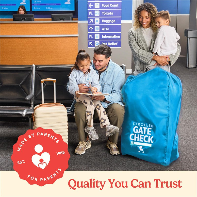 Neon blue J.L. Childress stroller gate check bag beside a family at an airport, with a parent reading to a child.