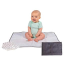 Extra-large grey baby changing pad bundle featuring a smiling baby in a mint green outfit, with cloths nearby.