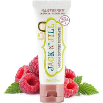 Natural toothpaste for babies and toddlers in raspberry flavor, featuring 40% xylitol and illustrated characters on the tube.