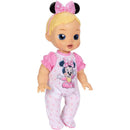 Interactive baby doll with blonde hair, wearing a pink outfit featuring Minnie Mouse, and a matching headband with ears.