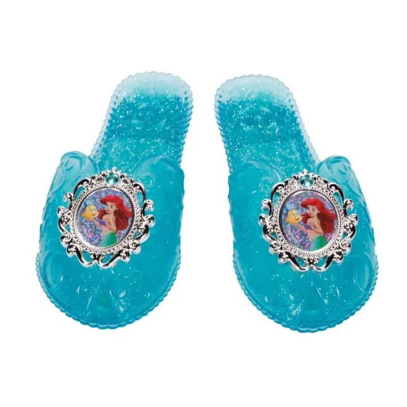 Blue glittery slip-on shoes featuring a decorative Ariel and Flounder image surrounded by an ornate silver frame.