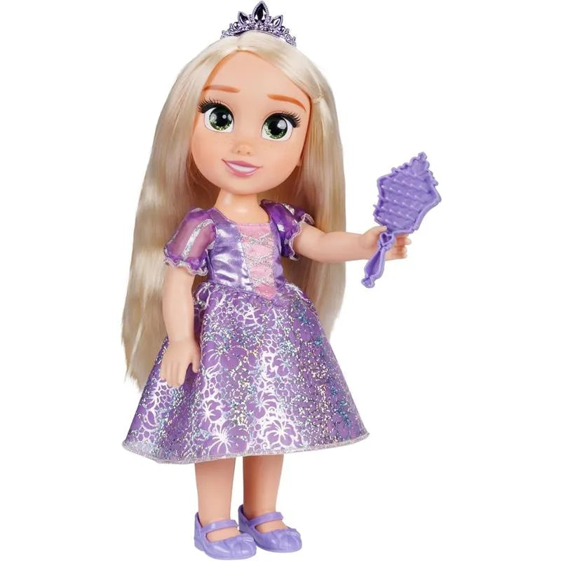 Large Rapunzel doll with long blonde hair, wearing a purple dress and holding a brush, features a tiara.