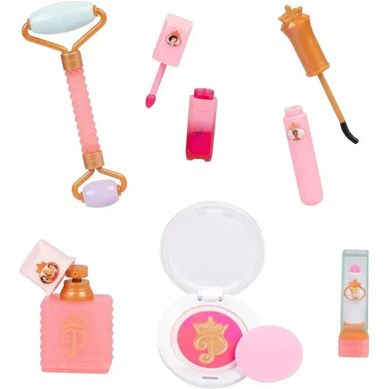Trendy makeup accessories including a roller, lip gloss, blush compact, and a perfume bottle, all themed with Disney Princess designs.